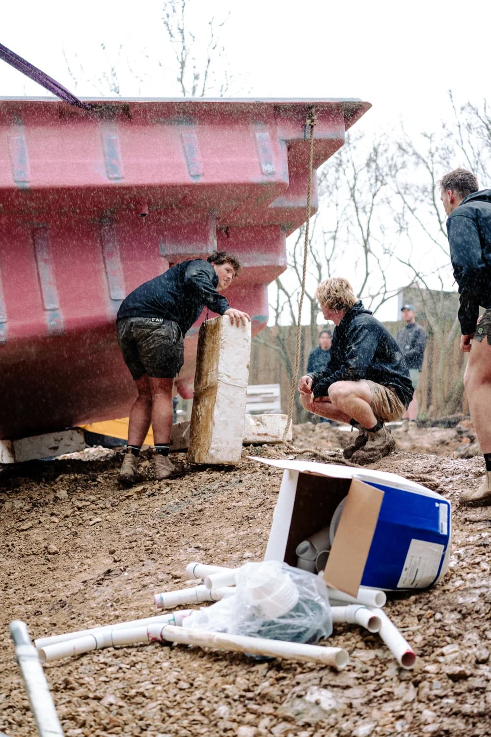 Enchanted Pools crew coordinating a fibreglass pool installation